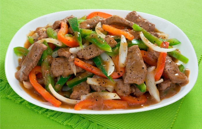 pepper steak on a plate on table 