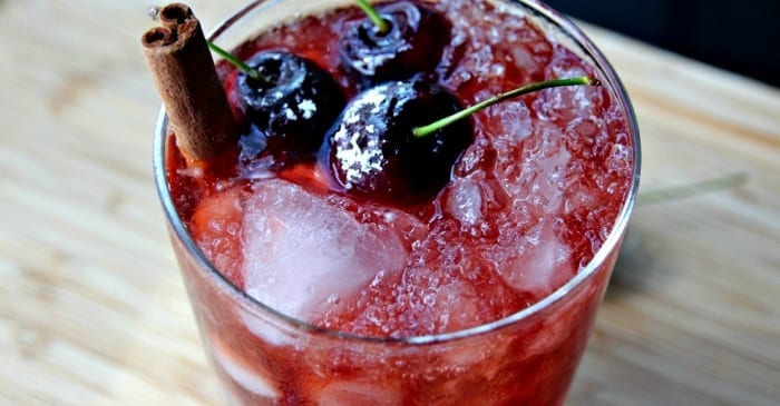 sweet cherry juice and rich whiskey bourbon give this fruity cocktail a sweet and summer-y twist