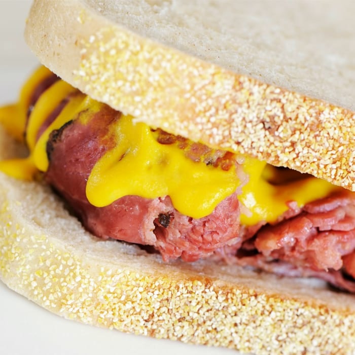 mustard on sandwich