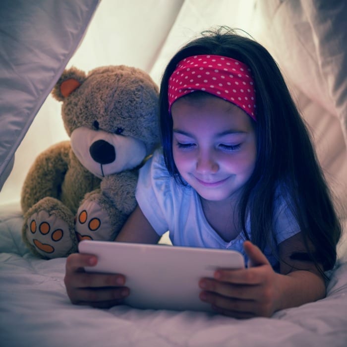 child with tablet