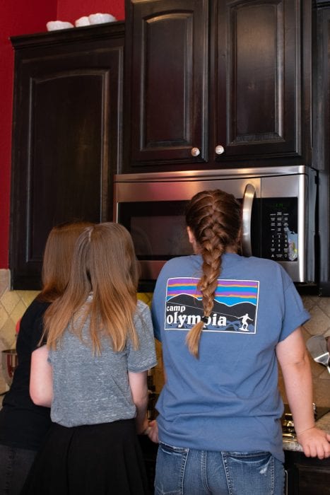 kids watching popcorn pop