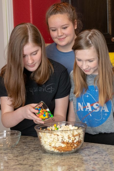 pouring in the candy