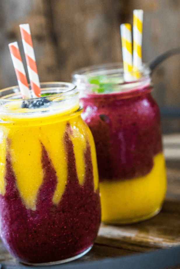 Have you ever been hyper-aware that you needed a pick-me-up in a bad way? Dude, this Pick-Me-Up Guaranteed Mango-Berry Smoothie is the solution for that problem. #smoothie #fruit #drink #breakfast
