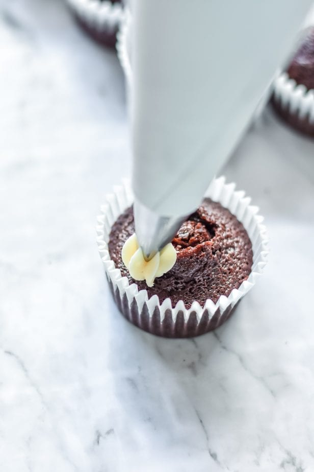 If you were hoping for a classic death-by-dessert, let me assure you that these decadent and creamy Salted Caramel Cupcakes deliver. #saltedcaramel #saltedcaramelcake #saltedcaramelcupckes #caramel