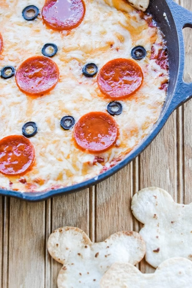 My kids were tired of the same-ole dinners, so I decided to make this fun Mickey Mouse Pizza Dip to mix it up! #weeknightdinnerrecipes #mickeymousefood #mickeymouseparty #pizza #pizzadip #pizzadiprecipe