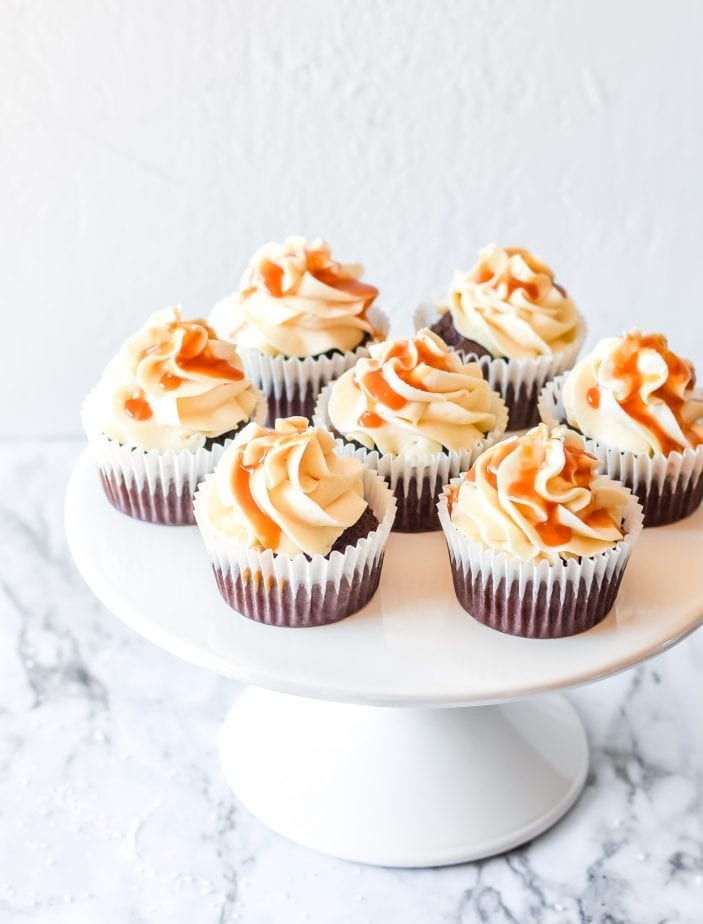 If you were hoping for a classic death-by-dessert, let me assure you that these decadent and creamy Salted Caramel Cupcakes deliver. #saltedcaramel #saltedcaramelcake #saltedcaramelcupckes #caramel