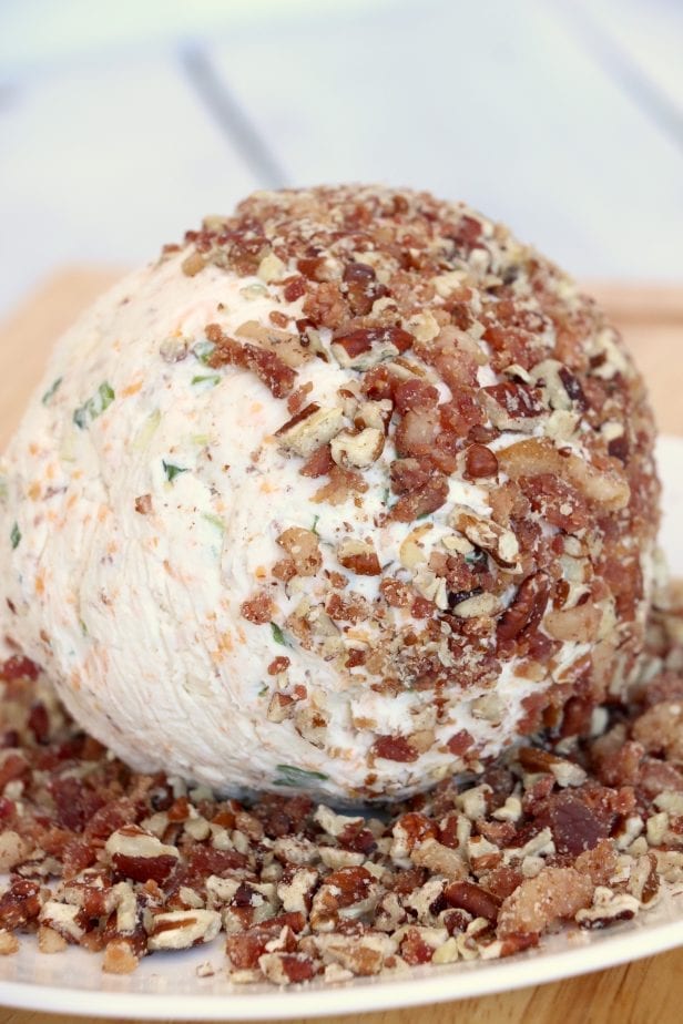 I needed a seriously good appetizer the other day for a party. This Mouthwateringly Good Bacon Blue Cheese Ball more than fit the bill. #bacon #cheeseball #cheeseballrecipe #appetizer