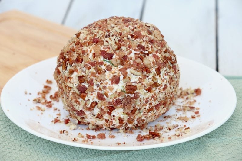 I needed a seriously good appetizer the other day for a party. This Mouthwateringly Good Bacon Blue Cheese Ball more than fit the bill. #bacon #cheeseball #cheeseballrecipe #appetizer