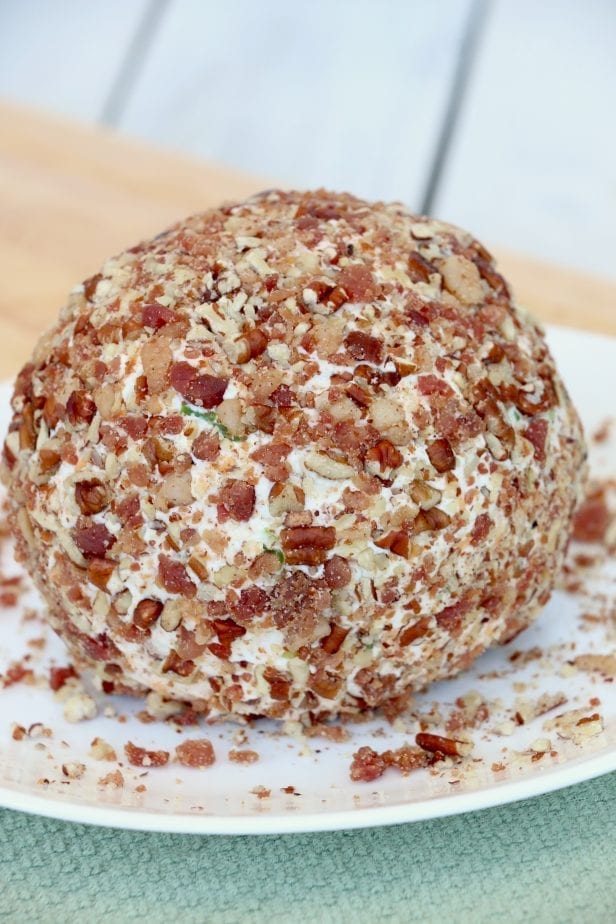 I needed a seriously good appetizer the other day for a party. This Mouthwateringly Good Bacon Blue Cheese Ball more than fit the bill. #bacon #cheeseball #cheeseballrecipe #appetizer