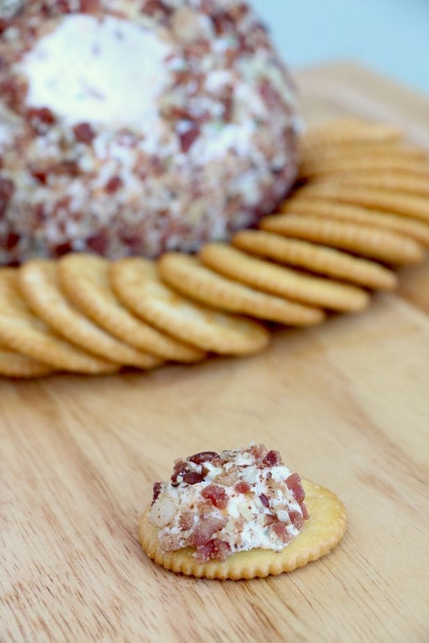 I needed a seriously good appetizer the other day for a party. This Mouthwateringly Good Bacon Blue Cheese Ball more than fit the bill. #bacon #cheeseball #cheeseballrecipe #appetizer