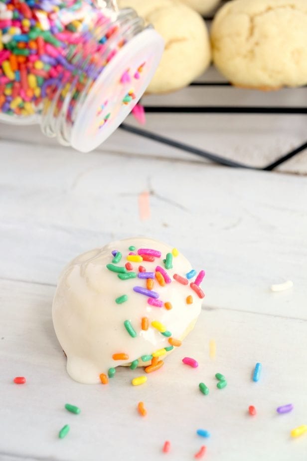 So soft and chewy, these Confetti Cookies are so ridiculously good, my mouth is watering for another taste. #confetticookies #cookies #cookierecipes #springcookies