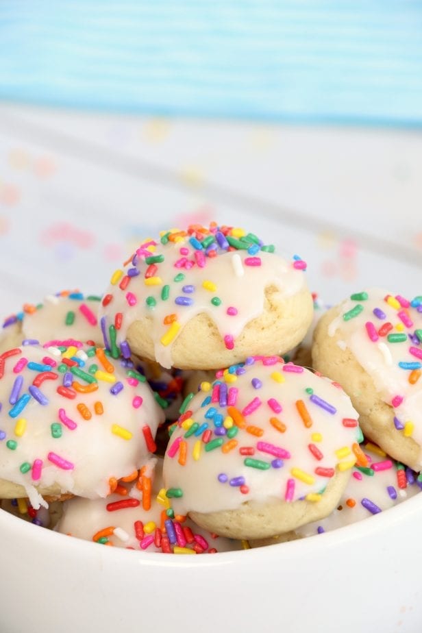 So soft and chewy, these Confetti Cookies are so ridiculously good, my mouth is watering for another taste. #confetticookies #cookies #cookierecipes #springcookies