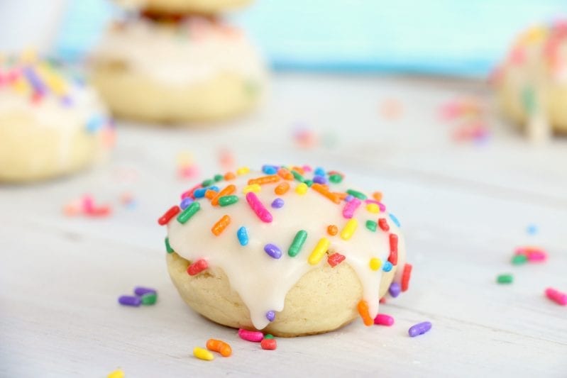 So soft and chewy, these Confetti Cookies are so ridiculously good, my mouth is watering for another taste. #confetticookies #cookies #cookierecipes #springcookies