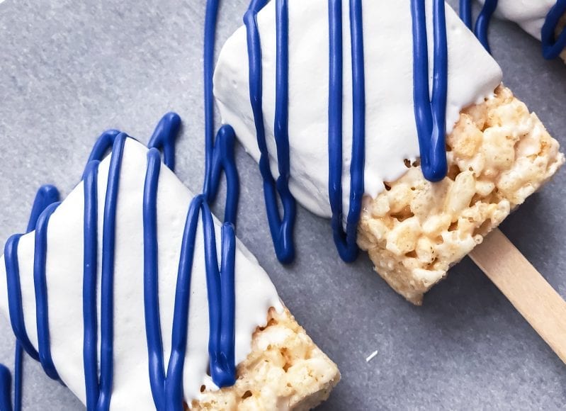 One of the best things about summer is July 4th. And these Patriotic Rice Krispie Treats are the perfect patriotic celebration treat! #bbq #summer #july4th #july4threcipe #patrioticfood #ricekrispietreats