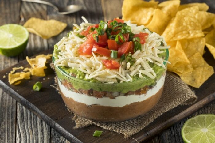 Homemade Chunky 7 Layer Dip with Beans, Sour Cream and Guacamole