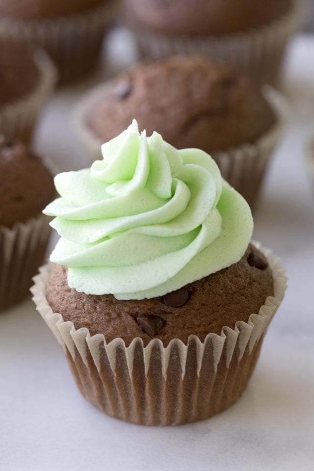 If you're love the combination of mint and chocolate, like me, you're going to LOVE these Wonderfully Minty Mint Chocolate Chip Cupcakes. They're moist, light, and so mint-chocolate-delicious, you'll be making a second batch same-day. #mintchocolatechip #mintchocolate #mintchocolatechipcupcakes