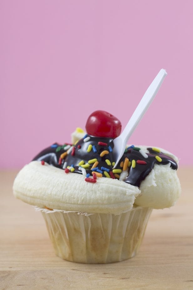 I am absolutely in love with these Banana Split Cupcakes! They’re so simple, but so cute, you’ll have a whole line of kiddos around the block wanting a cupcake of their very own. Or, just your own kids demanding seconds of these Banana Split Cupcakes—and thirds. #cupcakes #cupcakerecipe #bananasplitcupcakes