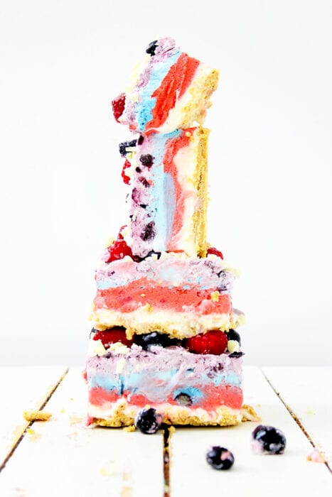 stacked no bake berry cheesecake bars