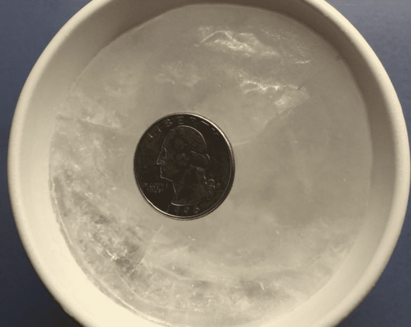 Here’s Why You Should Put A Quarter On Ice In Your Freezer