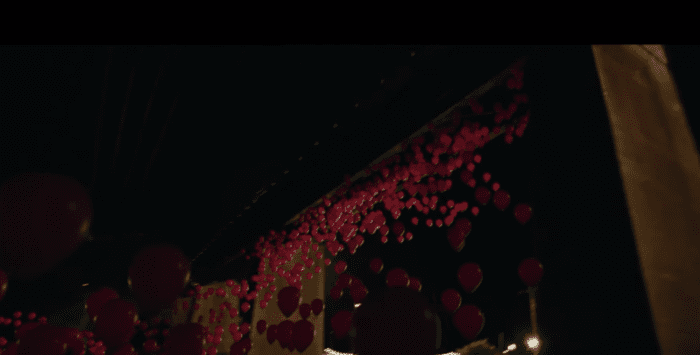 Red baloons in a scene from the movie IT: Chapter Two
