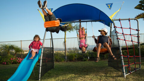 You Can Get A Swing Set For Your Kids That Has A Water-Mist Spray System To Keep Them Cool While Playing