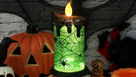 This Spinning Green Witches’ Candle Light Illuminates At Night For A Spooky Halloween Glow