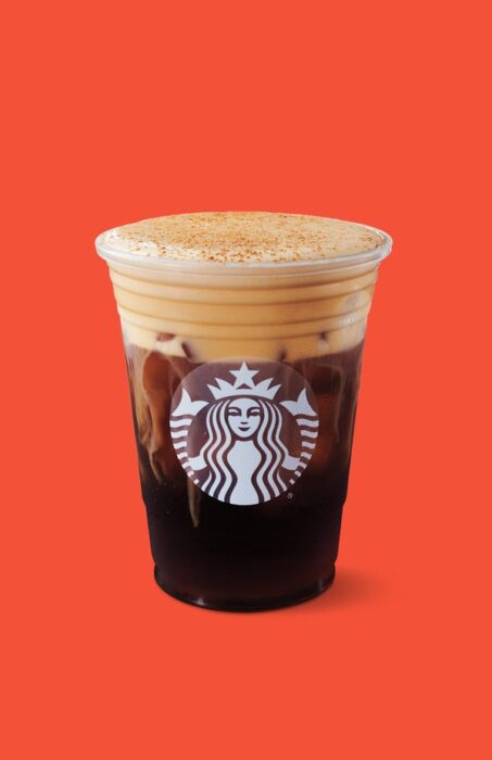 Starbucks cup filled with Starbucks Pumpkin Cream Cold Brew