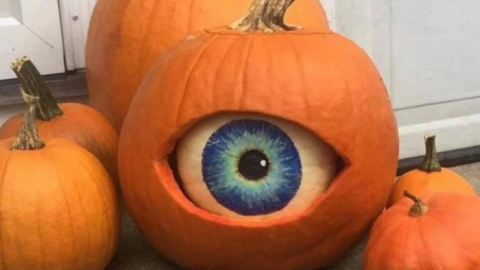 People Are Stuffing White Pumpkins Inside of Orange Pumpkins and Carving Them Into Eyes For Halloween