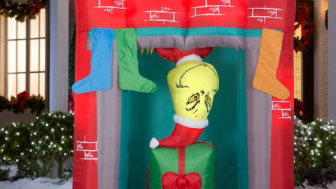You Can Get a 7 Foot Animatronic Grinch That Climbs Down the Chimney and Lights Up in Your Front Yard