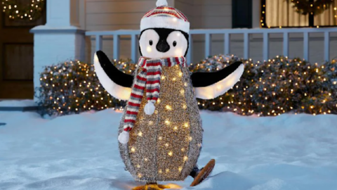 Home Depot Is Selling A Light-Up Skating Penguin You Can Put In Your Yard For The Holidays