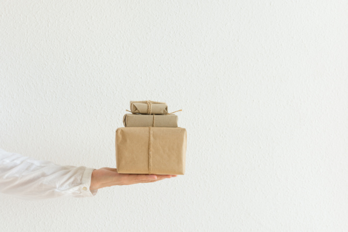 This image has an empty alt attribute; its file name is stacked-presents.jpg