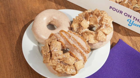 Krispy Kreme Releases Donuts Covered In Cinnamon Milk Glaze and Topped with Cinnamon Toast Crunch Pieces