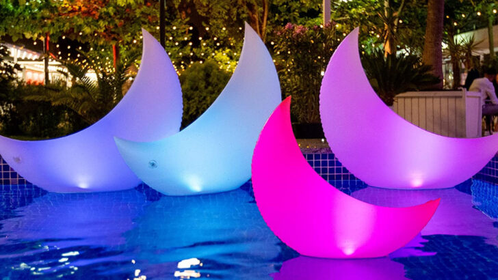 This Crescent Moon Pool Float Will Decorate Your Pool at Night With Neon Colors
