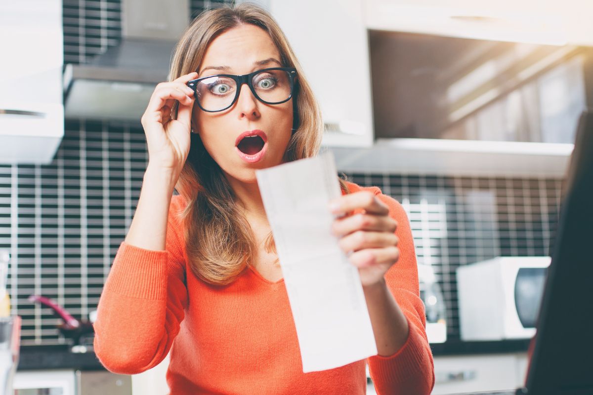 woman shocked at her grocery bill