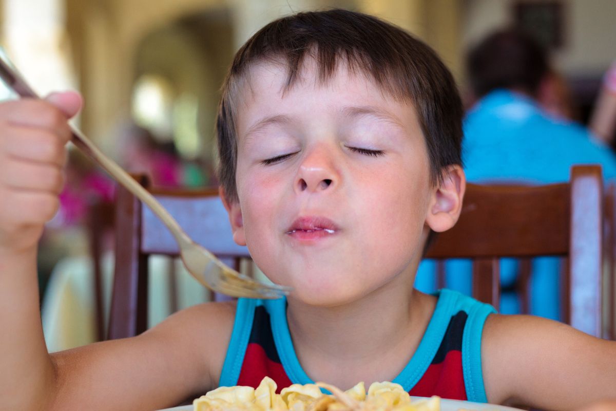 Little boy enjoying his food