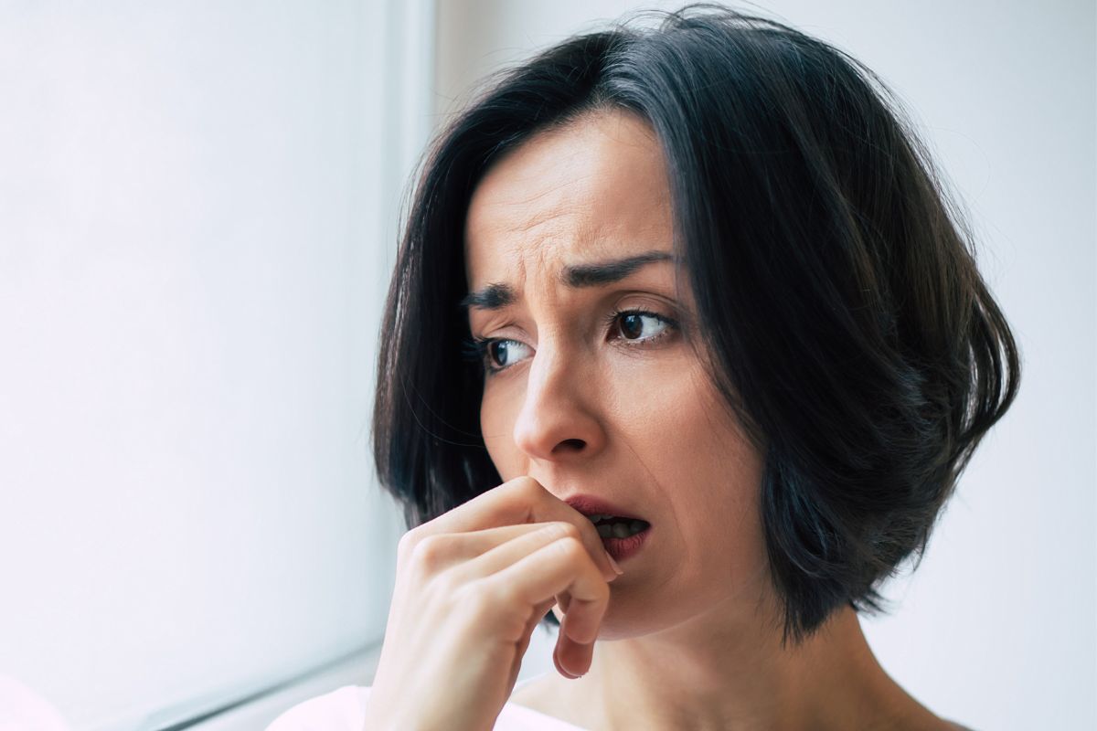 Sad woman looking out the window