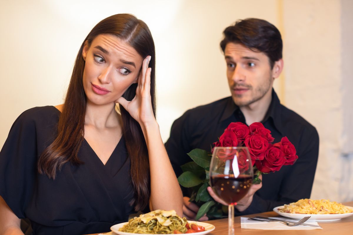 Woman looking awkward at her date