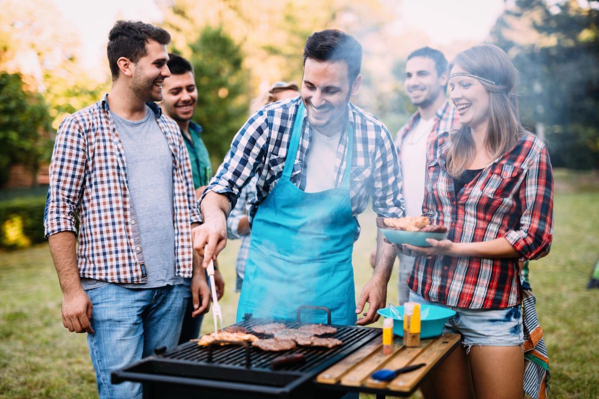 group of young people bbqing