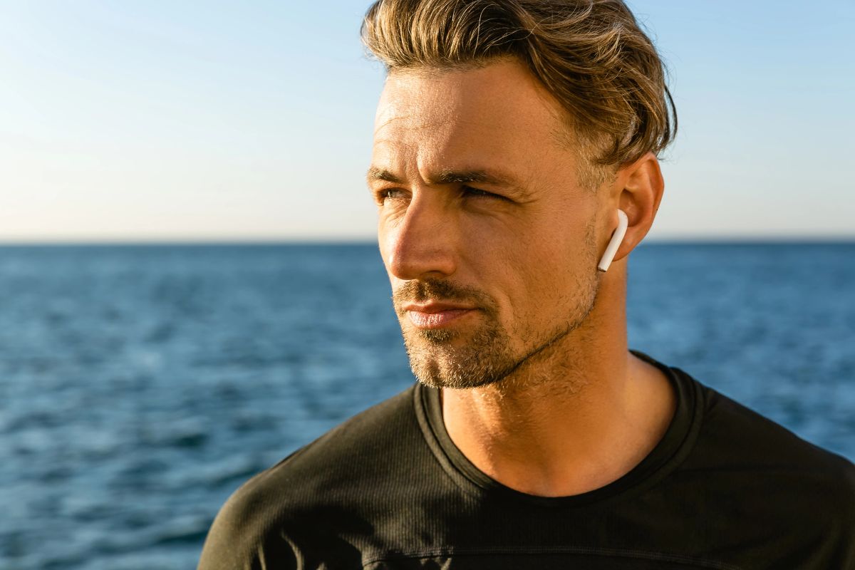 handsome man infront of water