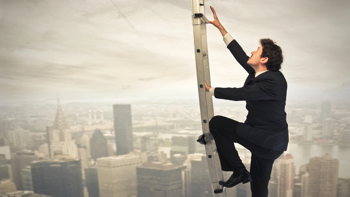 man climbing ladder