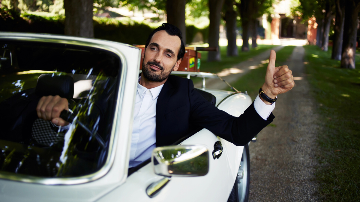 man in car