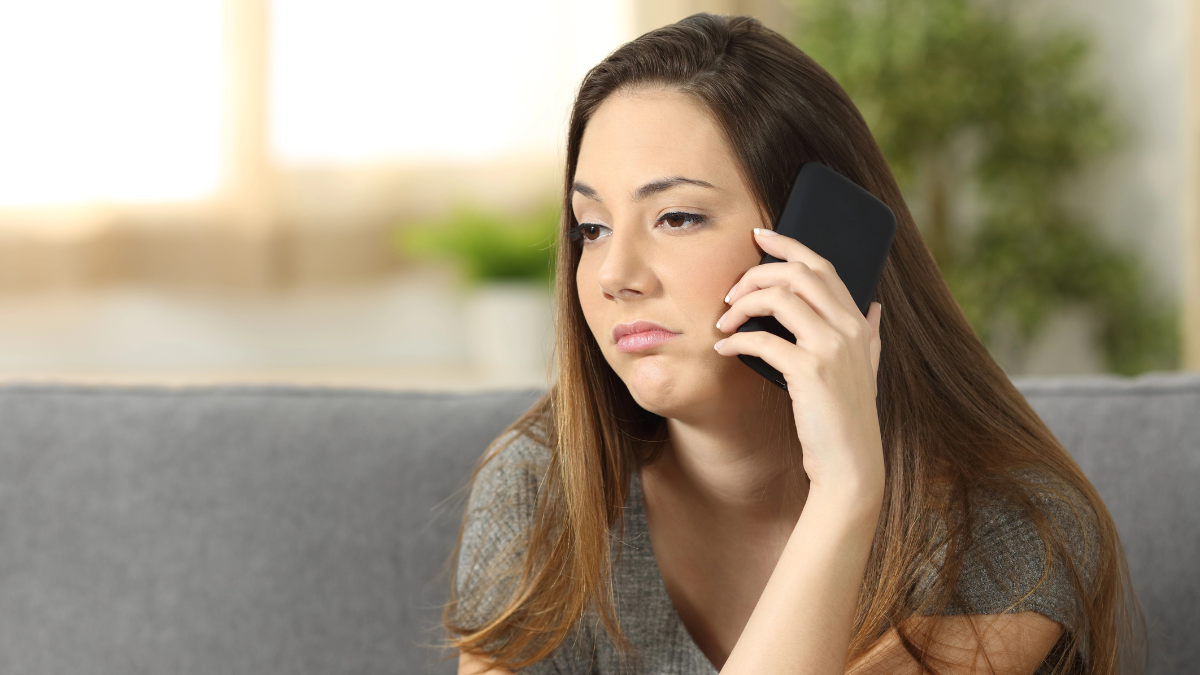 woman annoyed on phone