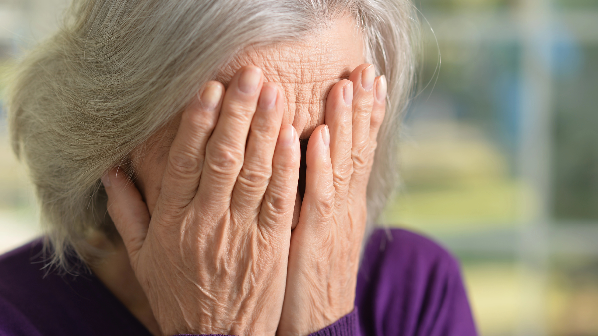 _woman covering face