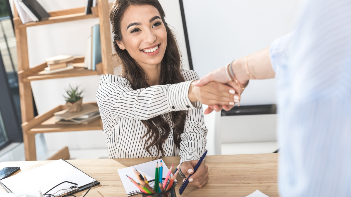 woman shaking hands
