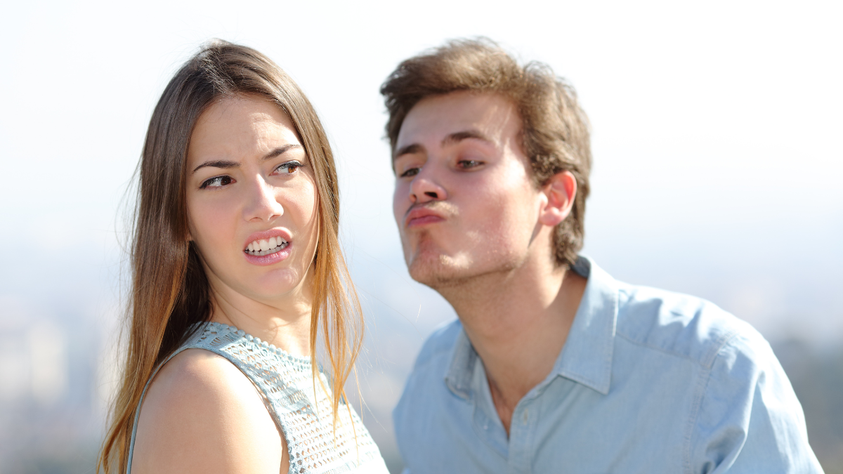 woman turning away from man