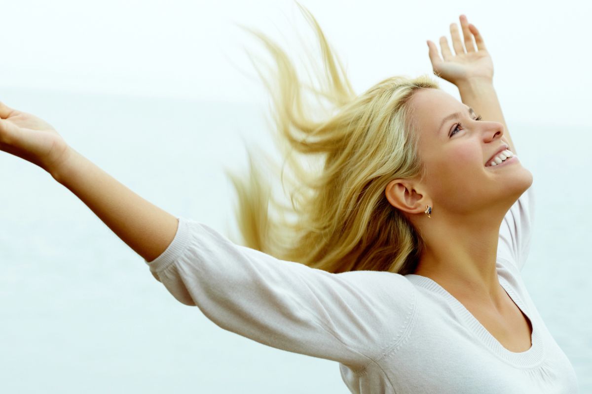 Woman stretching  her arms.
