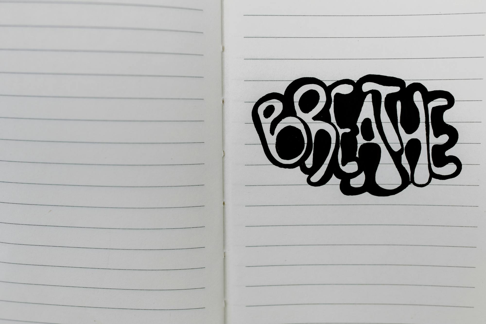 A Word Breath Written on a Notebook