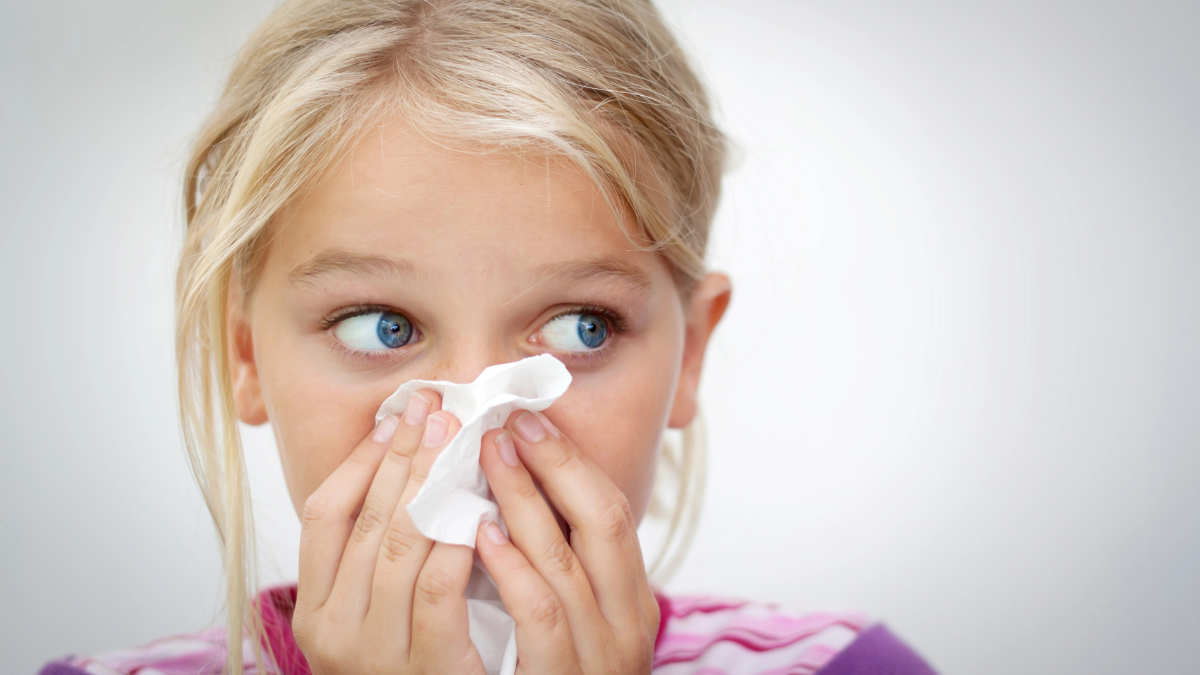 kid with tissues