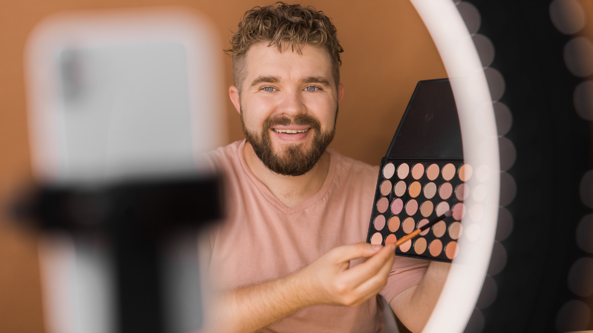 male blogger with make up