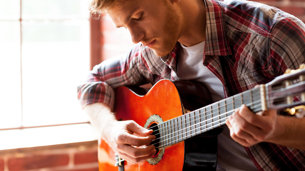 man playing guitar
